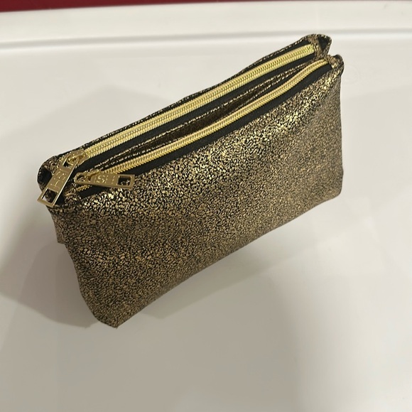ISH Handbags - ISH Black and Gold Makeup Bag NWOT